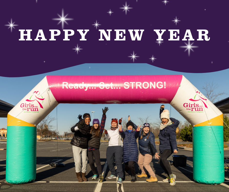 Happy new year written above an image of the Girls on the Run of Northern Virginia staff posing for a photo with their arms in the air under an inflatable arch.